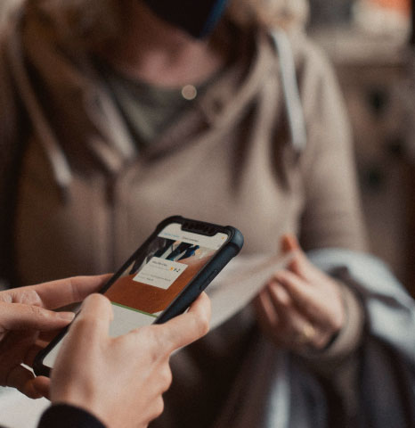 Guest using a phone during early check-in