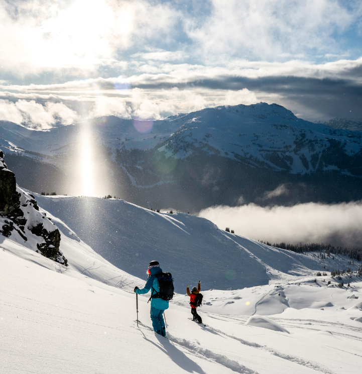 Skiers on an alpine slope